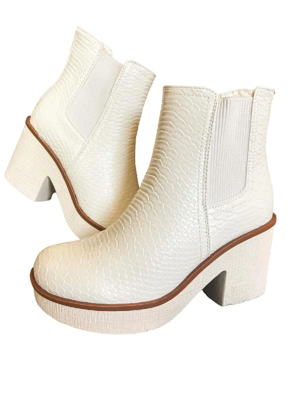 Women's Thigh - High Stretch Boots in Black for a Sexy and Alluring OutfitWomen's Little Bootie In White Women's Thigh - High Stretch Boots in Black for a Sexy and Alluring OutfitWomen's Little Bootie In White