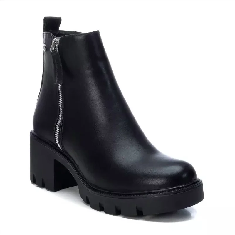 Women's Ankle Boots with Cut - Out Details in Beige for a Unique and Stylish EdgeWomen's Side Zipper Booties In Black Women's Ankle Boots with Cut - Out Details in Beige for a Unique and Stylish EdgeWomen's Side Zipper Booties In Black